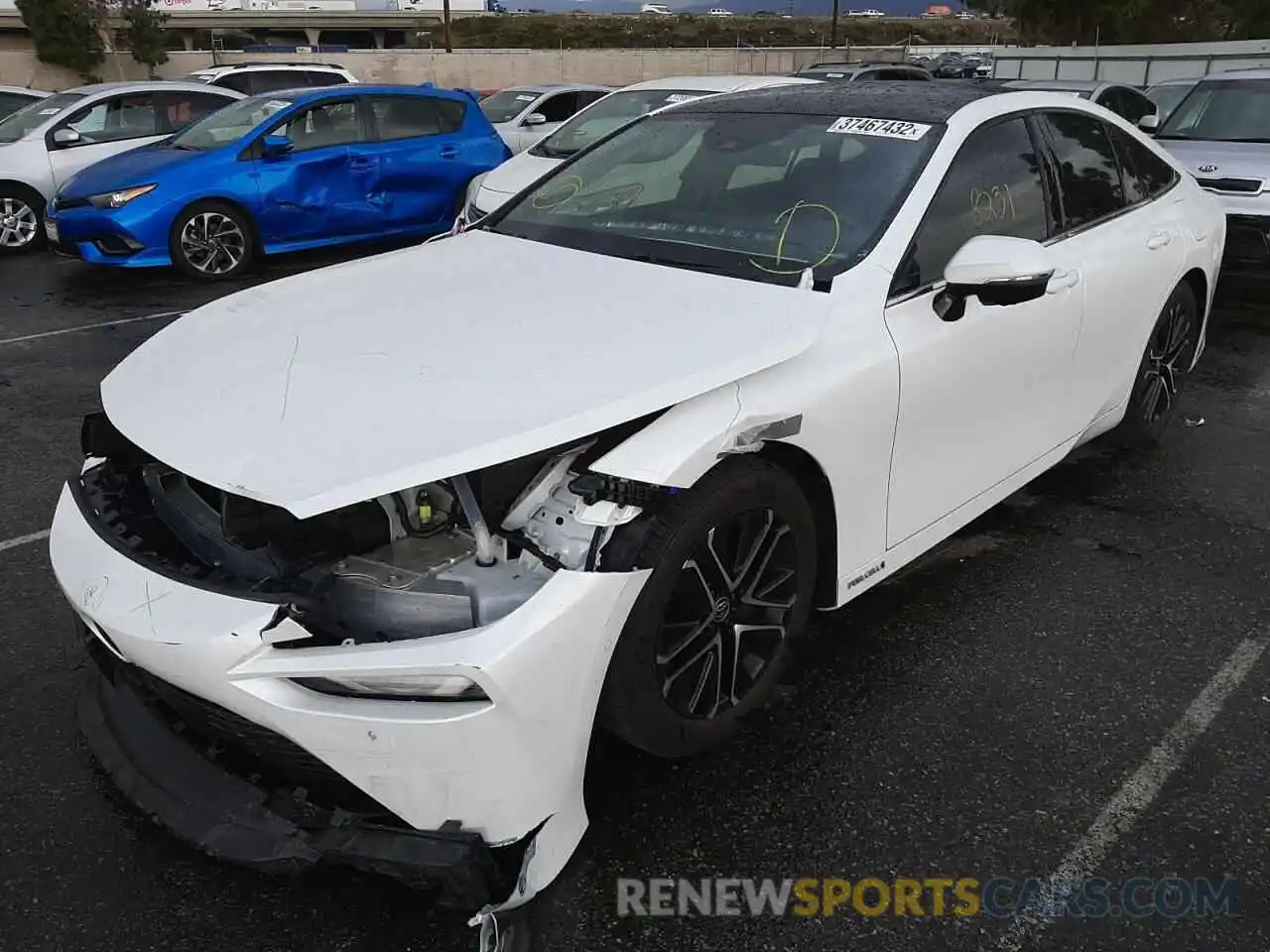 2 Photograph of a damaged car JTDAAAAA0MA000305 TOYOTA MIRAI 2021