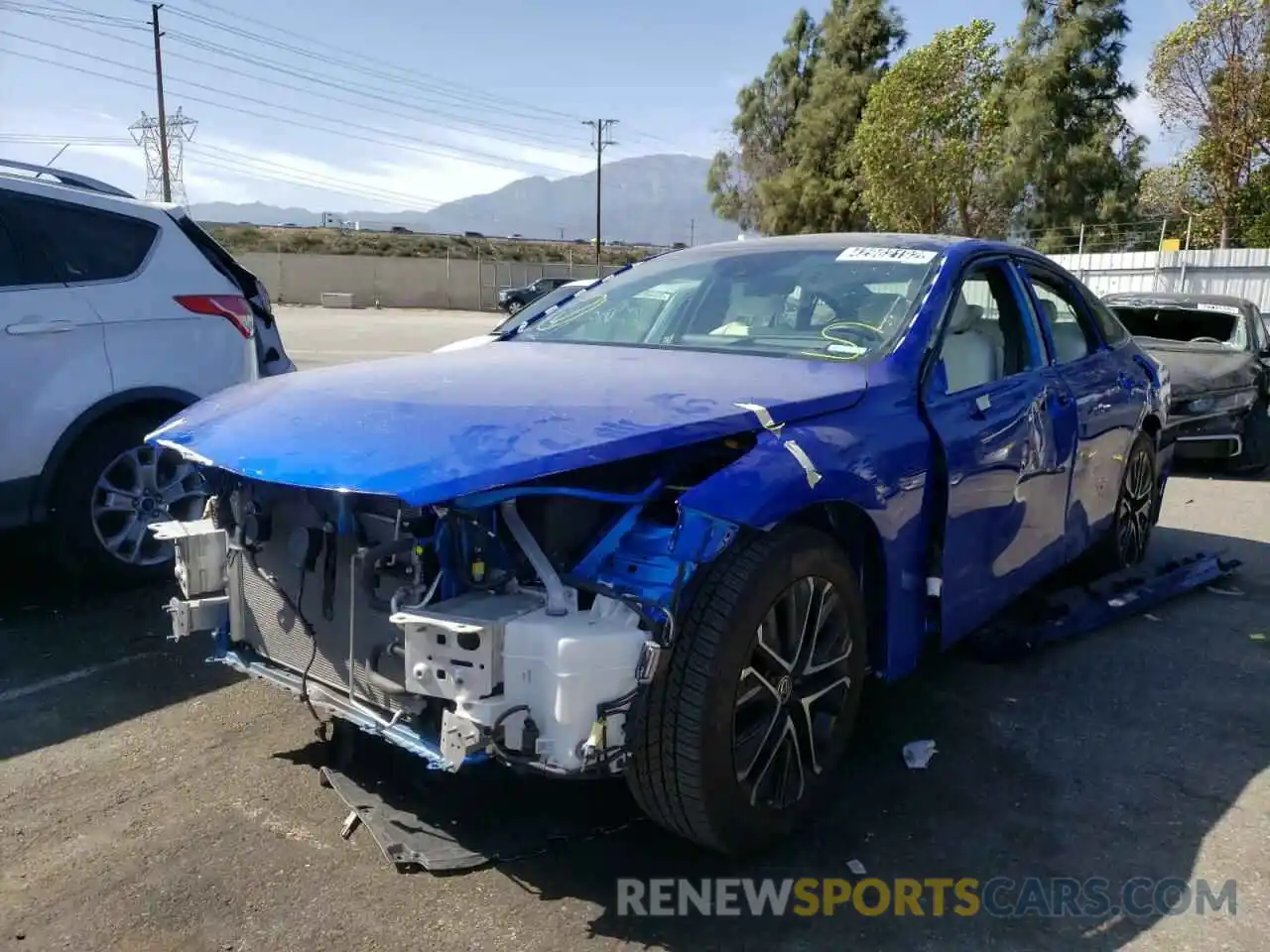 2 Photograph of a damaged car JTDAAAAA4MA002378 TOYOTA MIRAI 2021