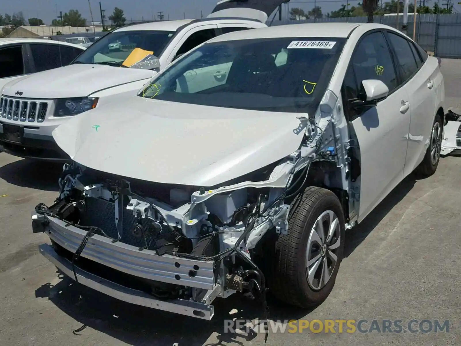 2 Photograph of a damaged car JTDKARFP9K3118015 TOYOTA PRIUS 2019