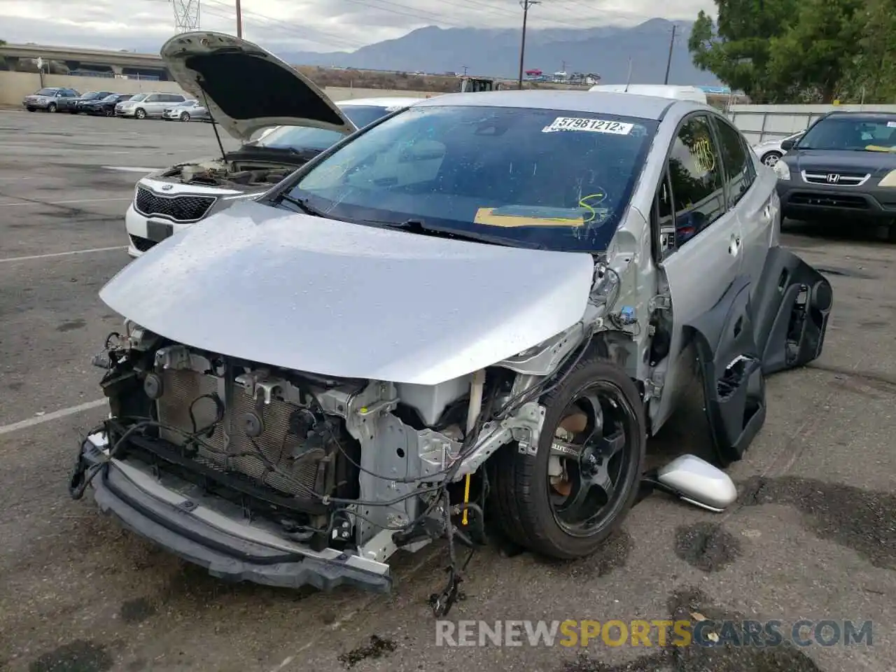 2 Фотография поврежденного автомобиля JTDKARFPXK3115995 TOYOTA PRIUS 2019