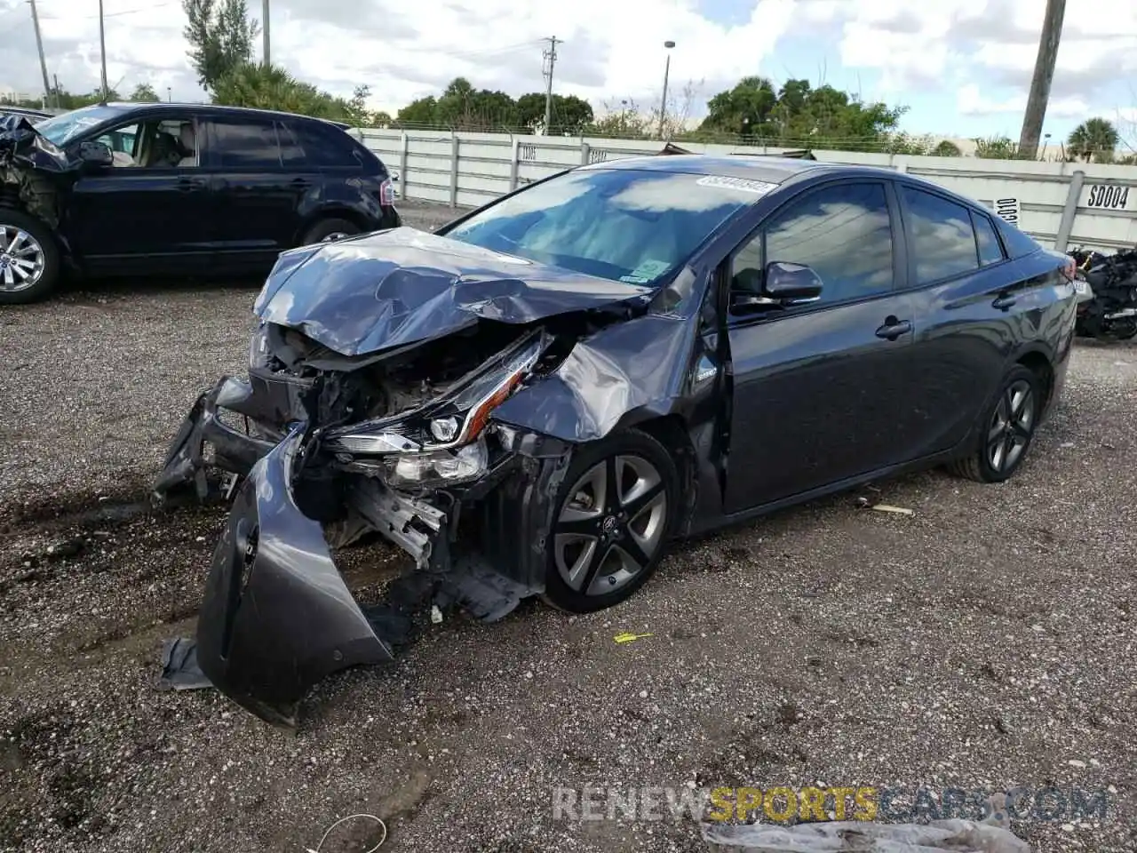 2 Photograph of a damaged car JTDKARFU0K3073858 TOYOTA PRIUS 2019