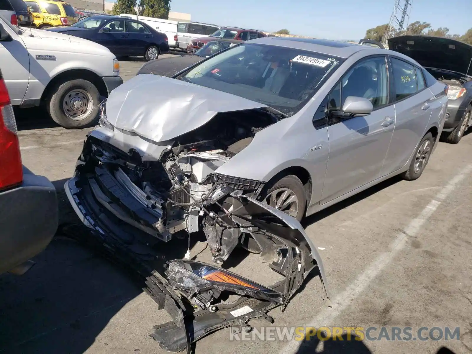 2 Photograph of a damaged car JTDKARFU0K3079949 TOYOTA PRIUS 2019