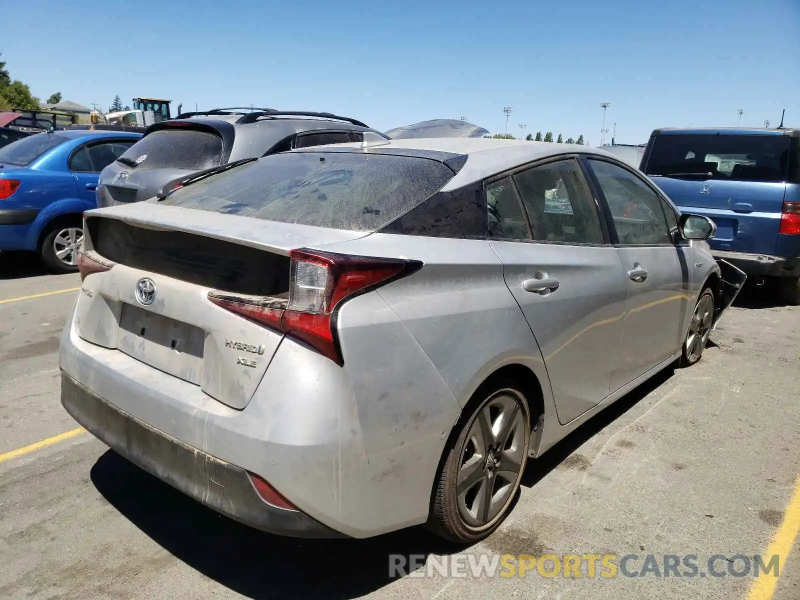 4 Photograph of a damaged car JTDKARFU0K3091132 TOYOTA PRIUS 2019