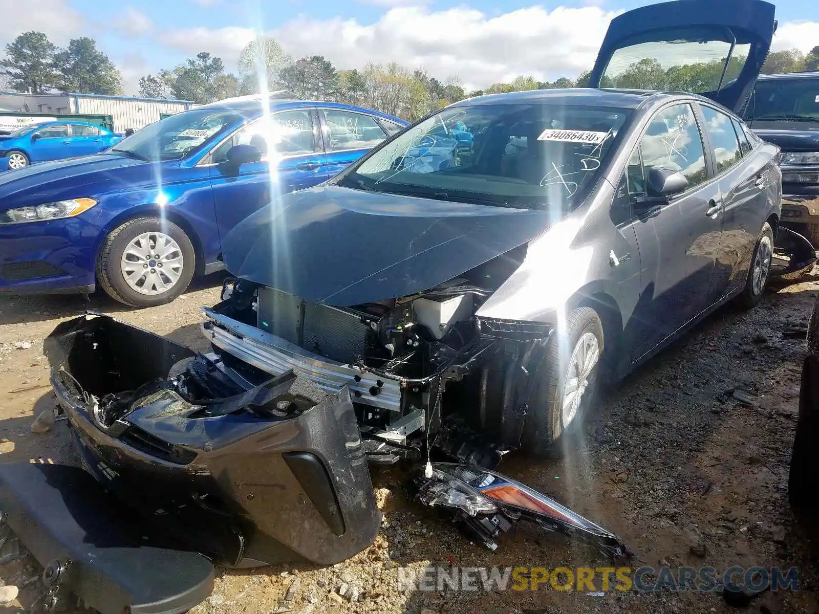 2 Photograph of a damaged car JTDKARFU0K3092586 TOYOTA PRIUS 2019