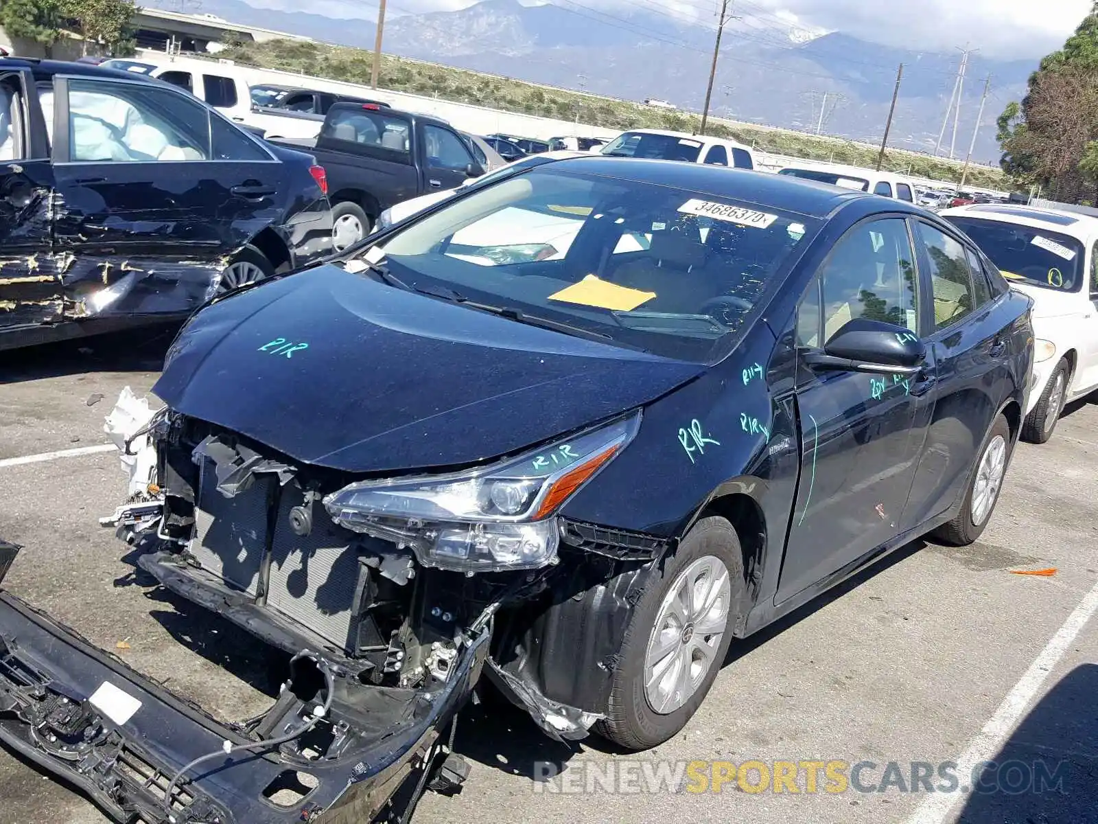 2 Photograph of a damaged car JTDKARFU1K3074324 TOYOTA PRIUS 2019