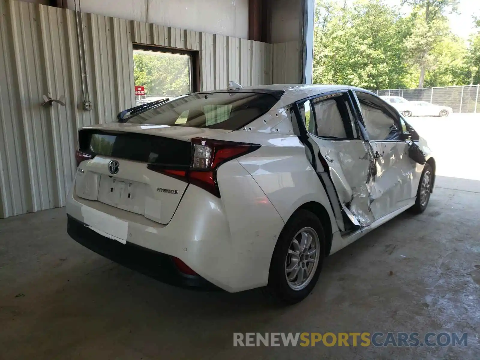 4 Photograph of a damaged car JTDKARFU1K3096338 TOYOTA PRIUS 2019