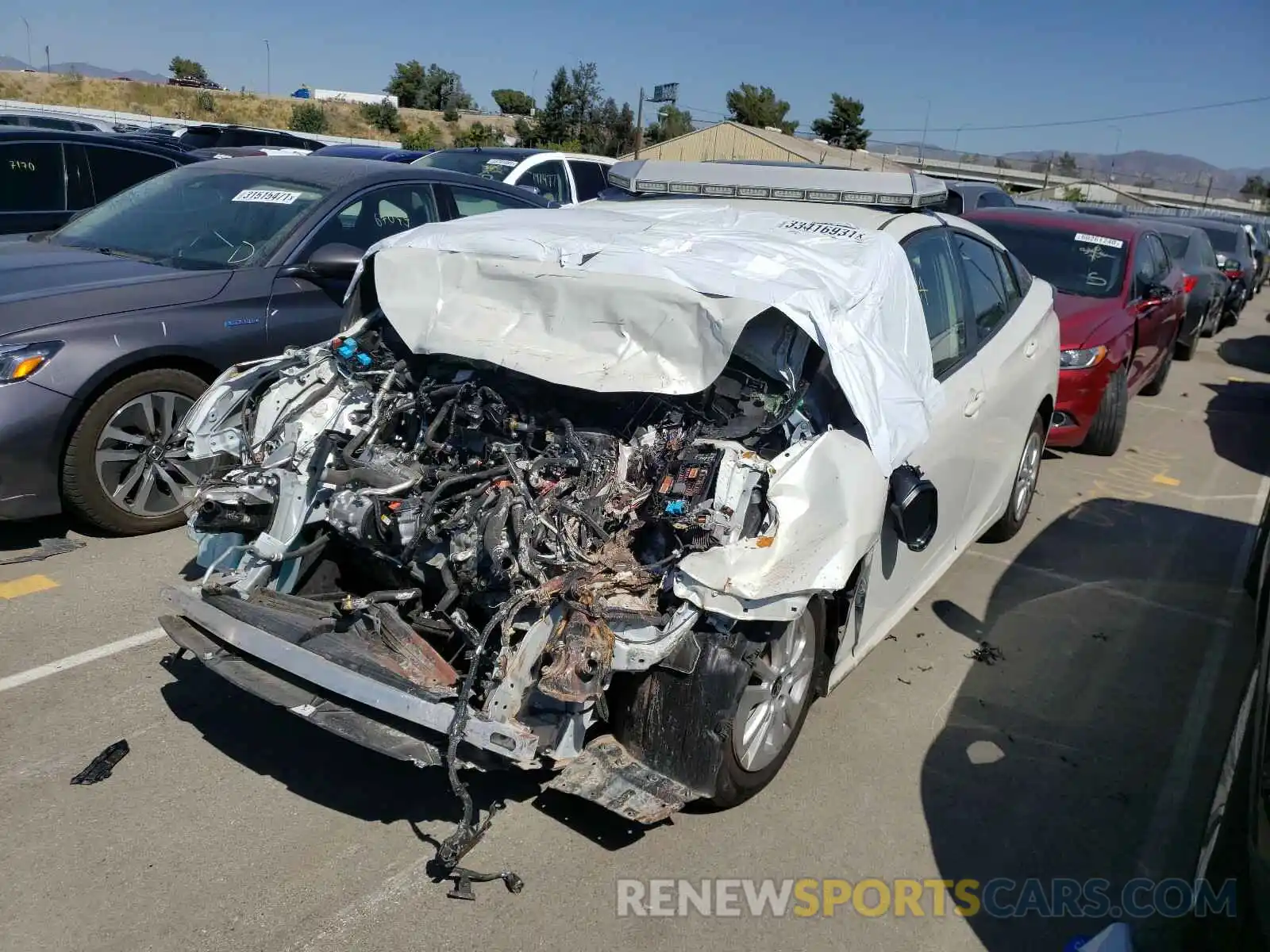 2 Photograph of a damaged car JTDKARFU1K3098090 TOYOTA PRIUS 2019