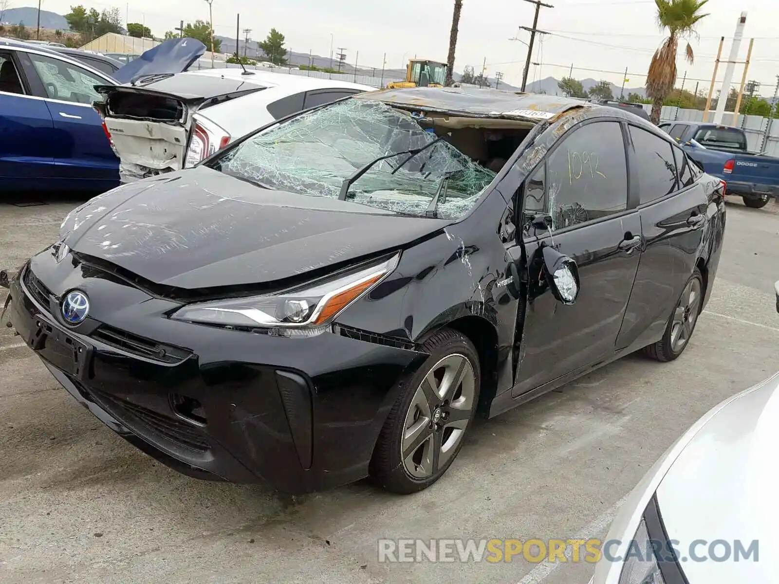 2 Photograph of a damaged car JTDKARFU3K3089391 TOYOTA PRIUS 2019