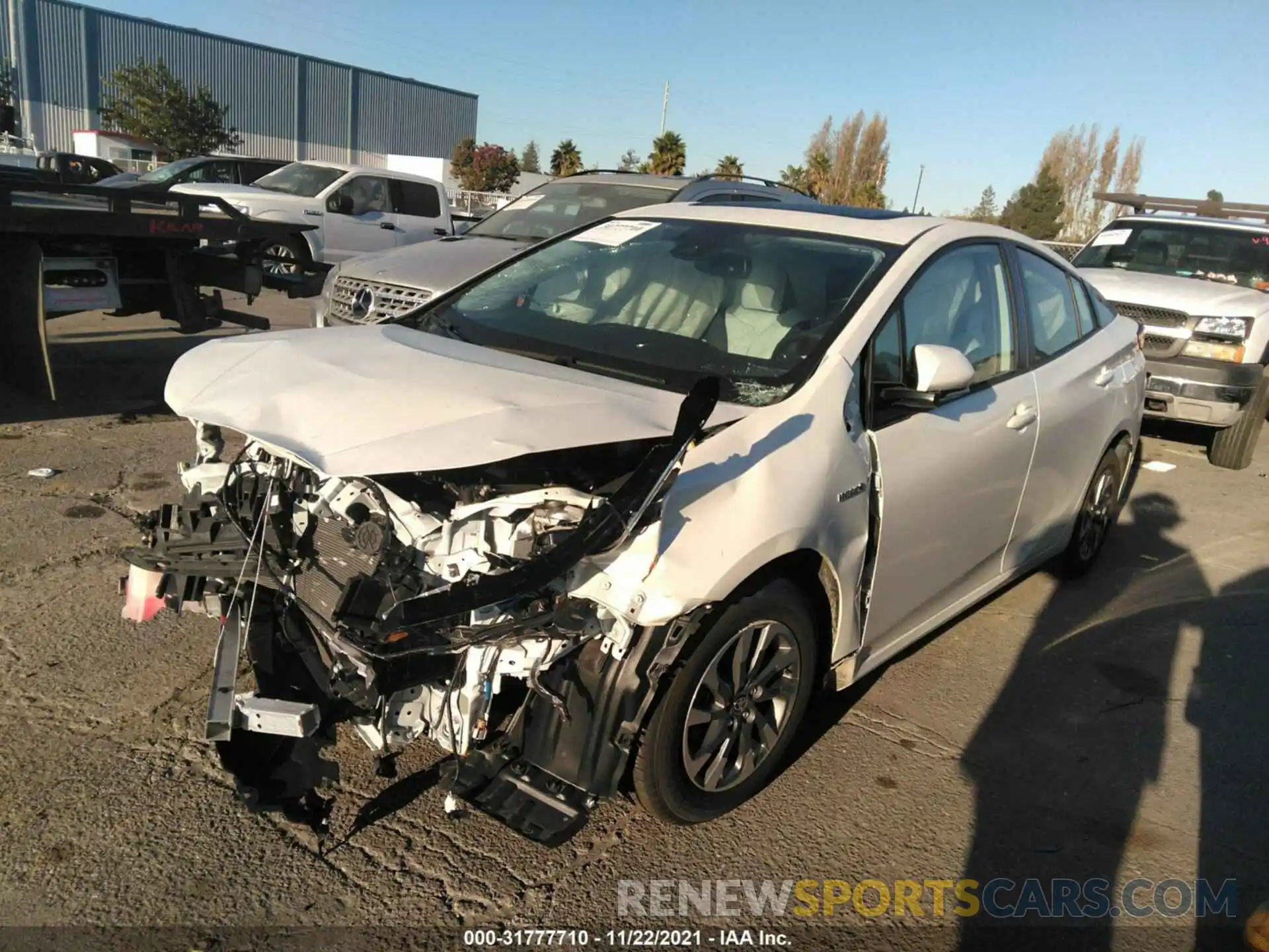 2 Photograph of a damaged car JTDKARFU4K3077413 TOYOTA PRIUS 2019