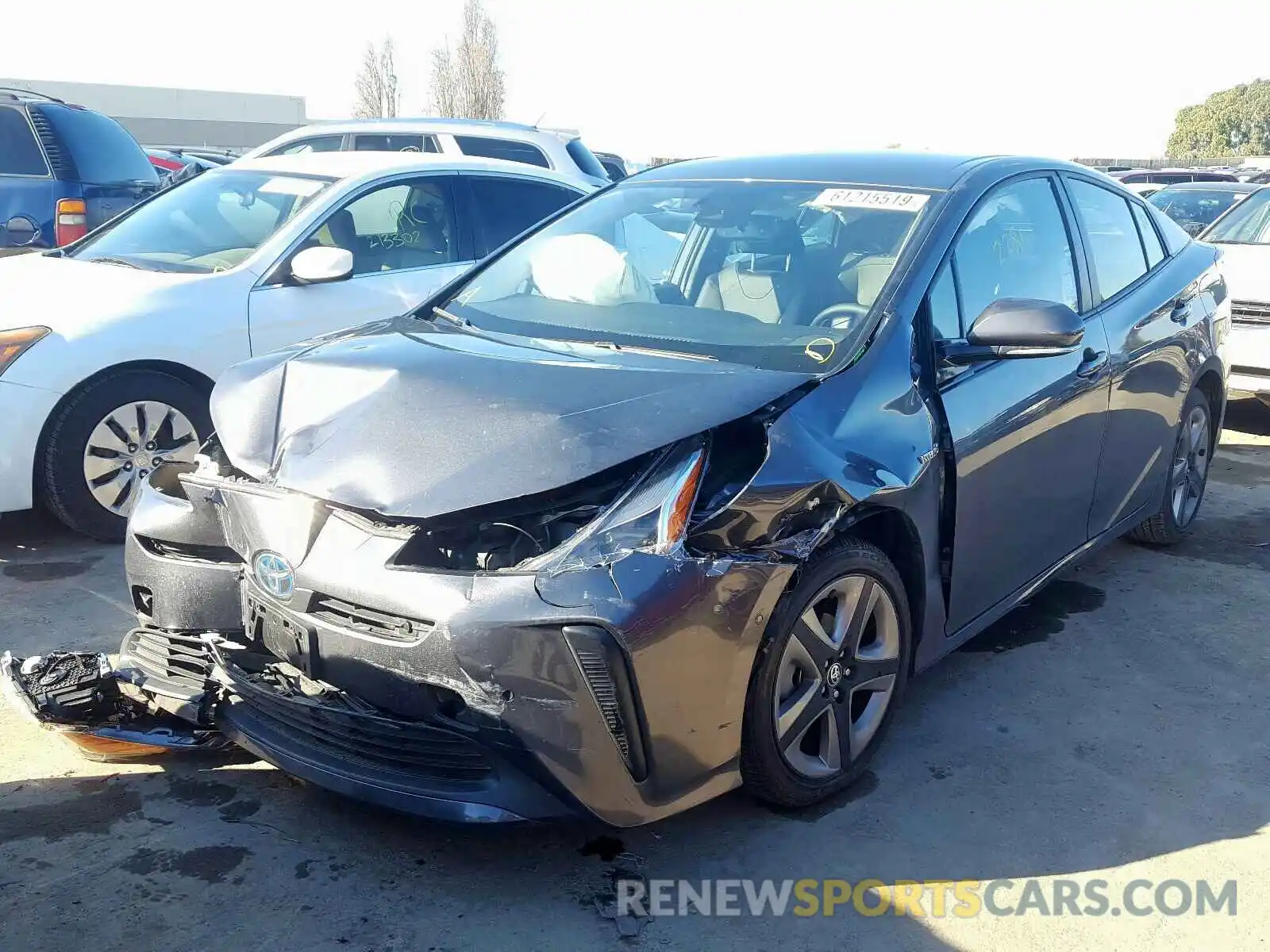 2 Photograph of a damaged car JTDKARFU5K3070423 TOYOTA PRIUS 2019