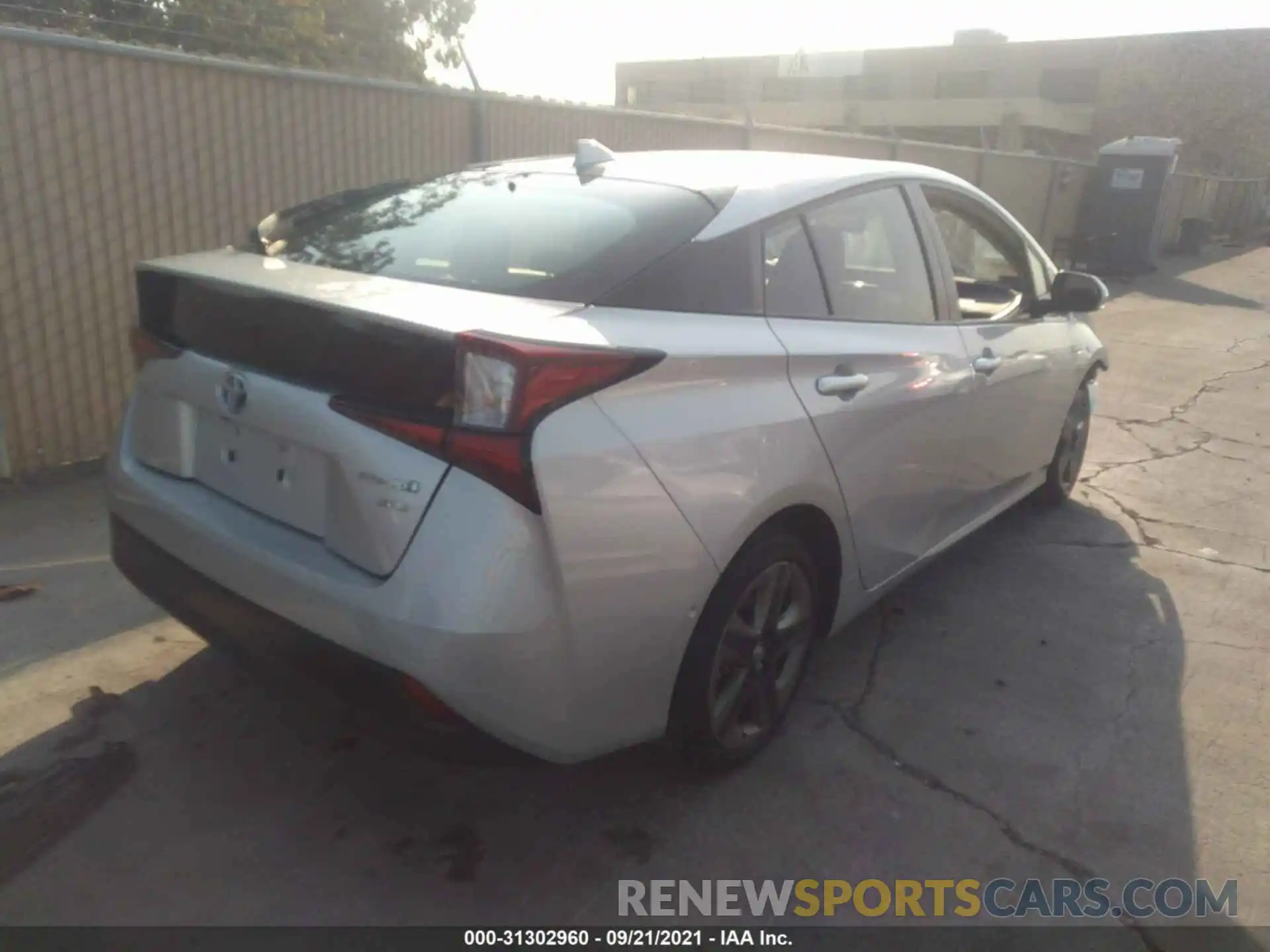 4 Photograph of a damaged car JTDKARFU5K3079722 TOYOTA PRIUS 2019