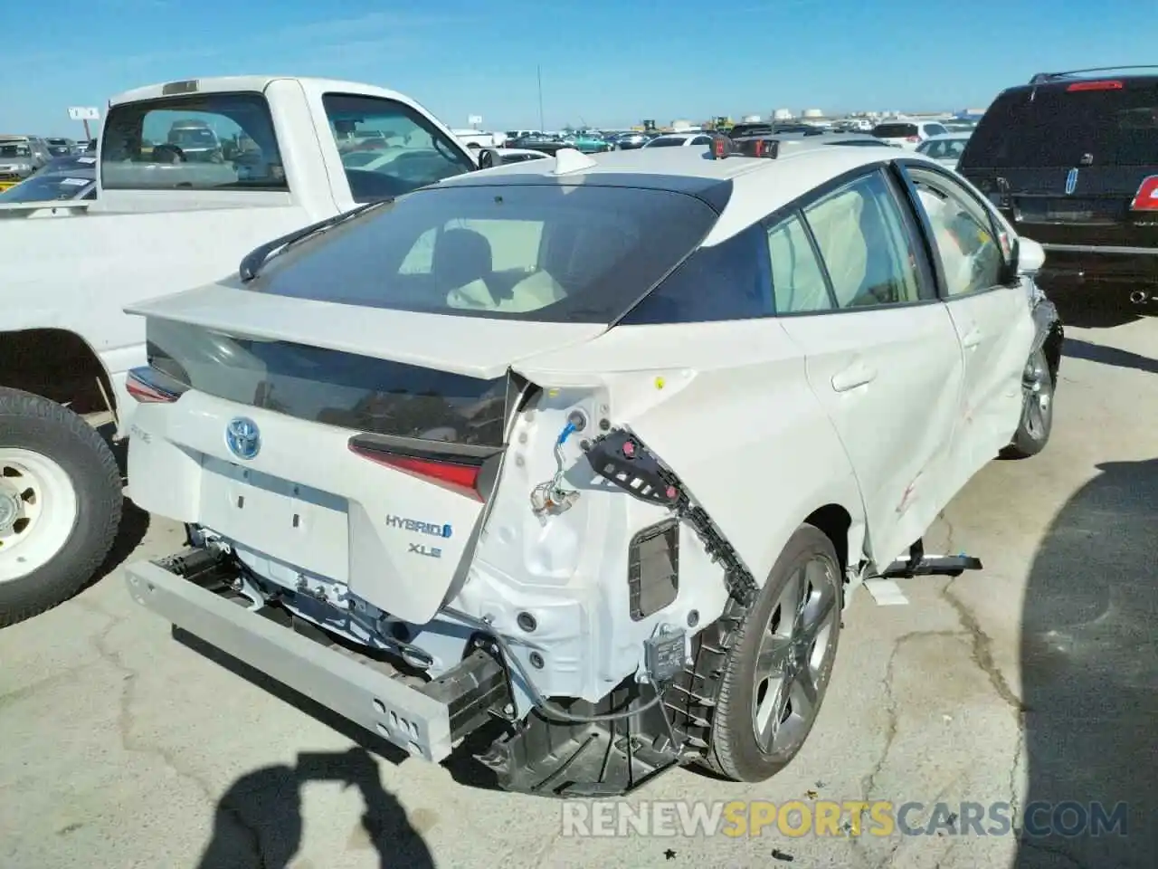 4 Photograph of a damaged car JTDKARFU5K3093359 TOYOTA PRIUS 2019