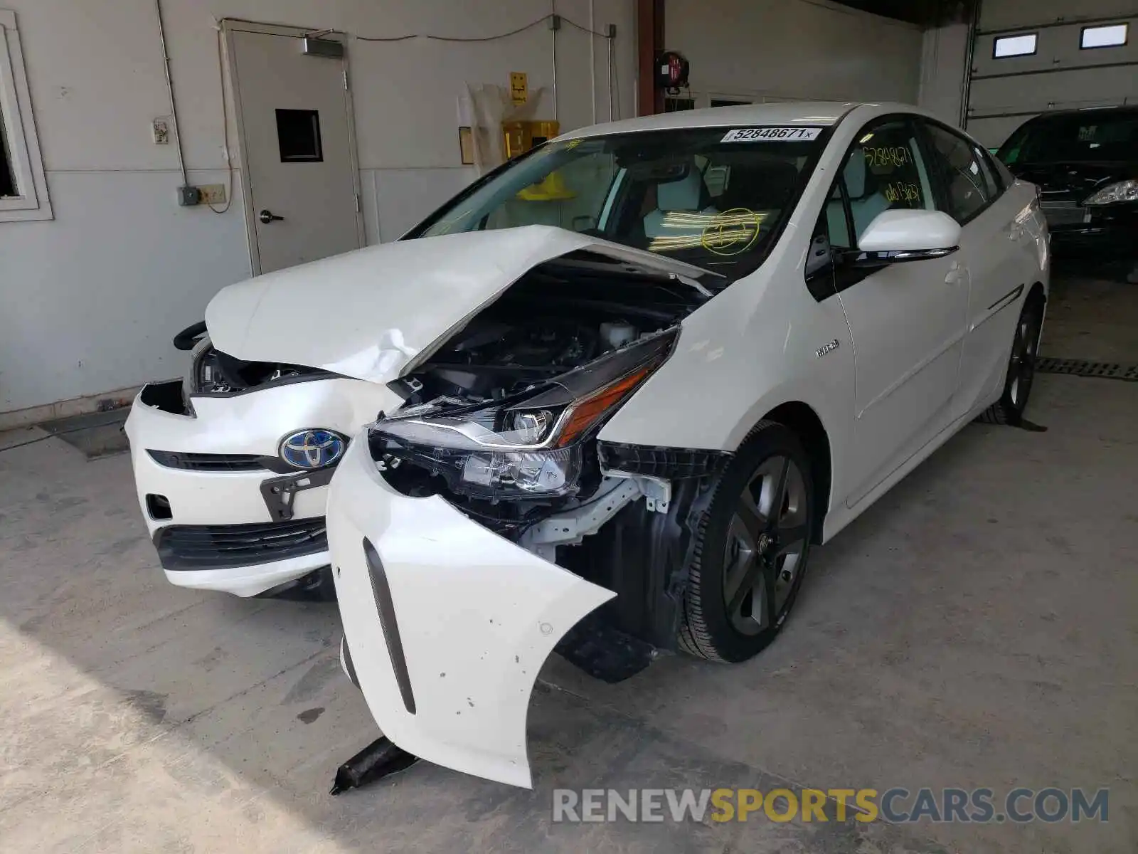 2 Photograph of a damaged car JTDKARFU5K3093975 TOYOTA PRIUS 2019