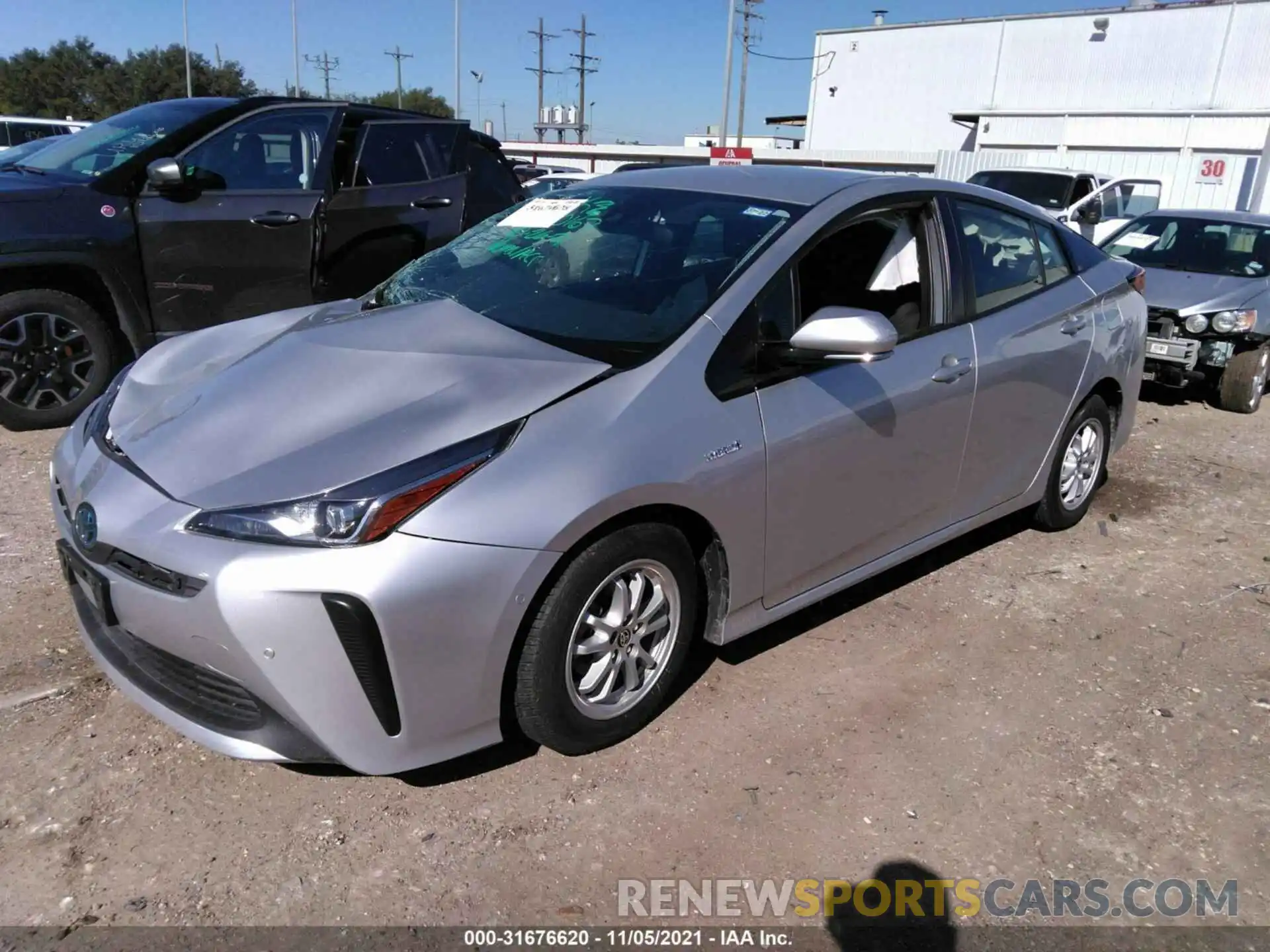 2 Photograph of a damaged car JTDKARFU6K3093547 TOYOTA PRIUS 2019