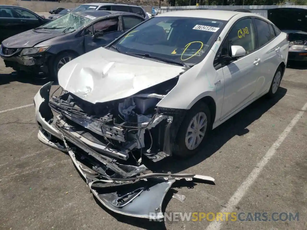 2 Photograph of a damaged car JTDKARFU6K3094178 TOYOTA PRIUS 2019