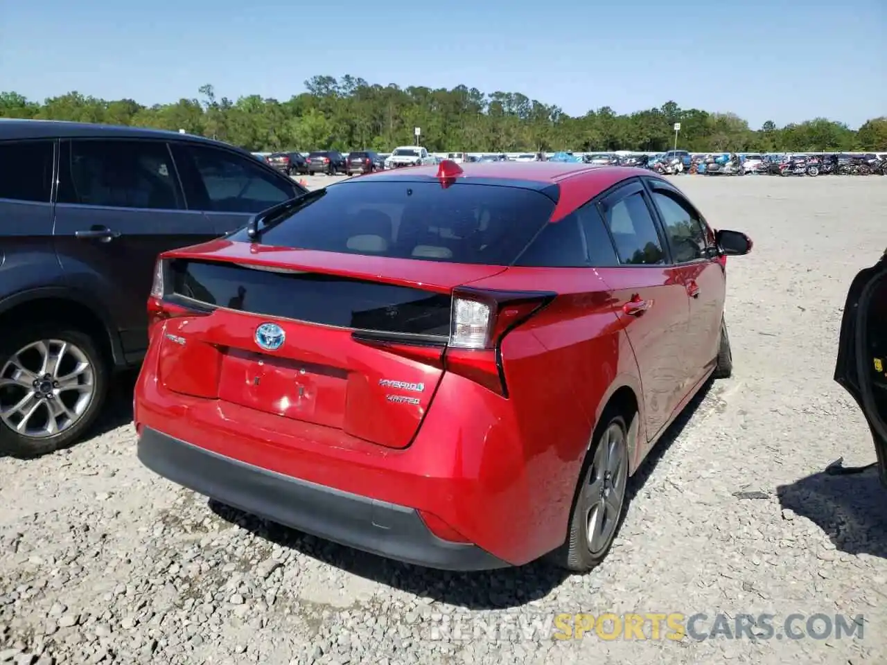 4 Photograph of a damaged car JTDKARFU7K3074022 TOYOTA PRIUS 2019