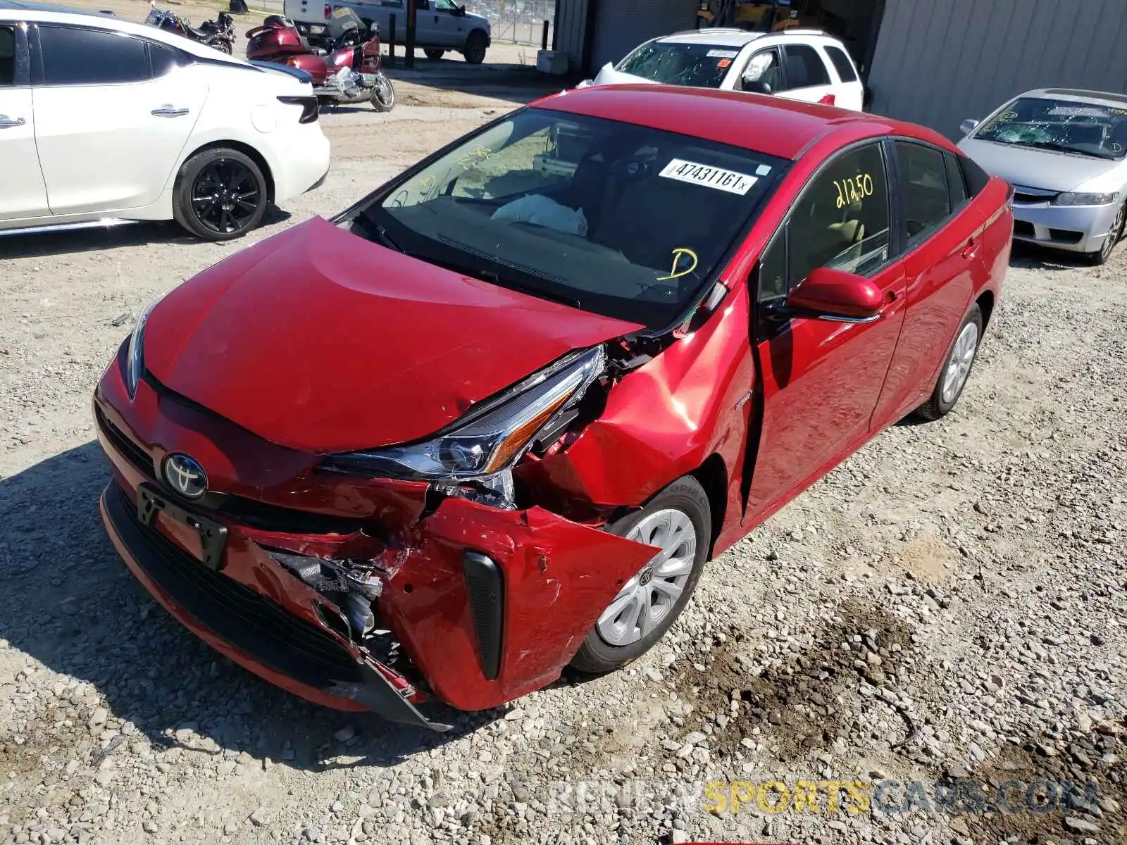 2 Photograph of a damaged car JTDKARFU7K3076675 TOYOTA PRIUS 2019