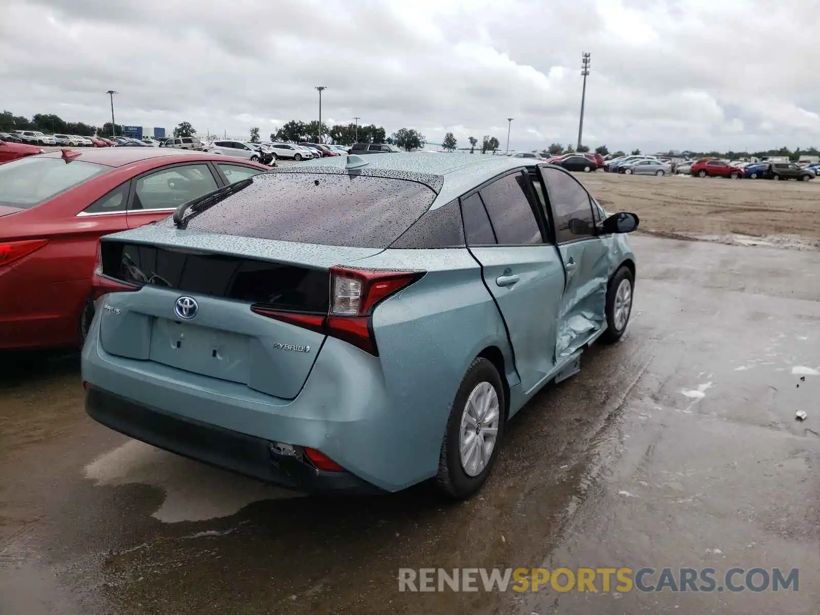 4 Photograph of a damaged car JTDKARFU7K3082623 TOYOTA PRIUS 2019