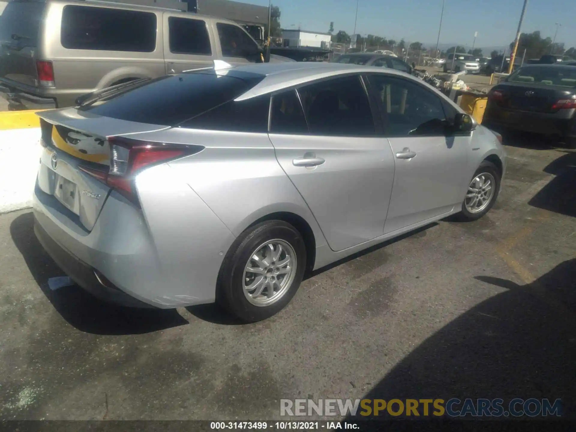 4 Photograph of a damaged car JTDKARFU7K3085599 TOYOTA PRIUS 2019