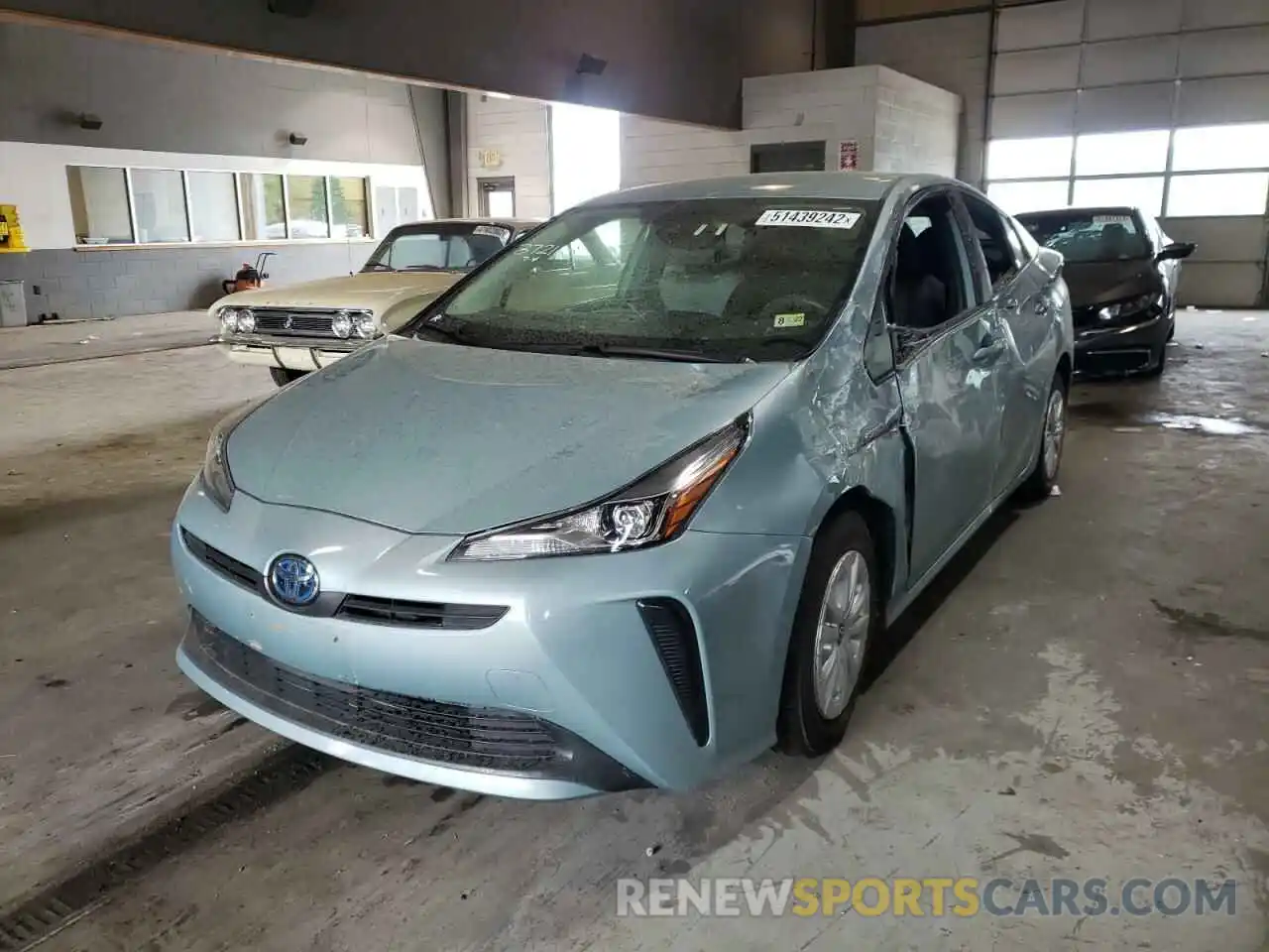 2 Photograph of a damaged car JTDKARFU7K3087482 TOYOTA PRIUS 2019