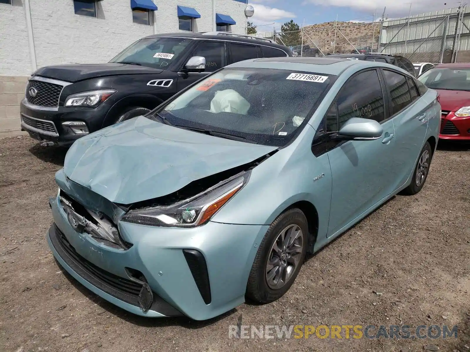 2 Photograph of a damaged car JTDKARFU7K3091693 TOYOTA PRIUS 2019