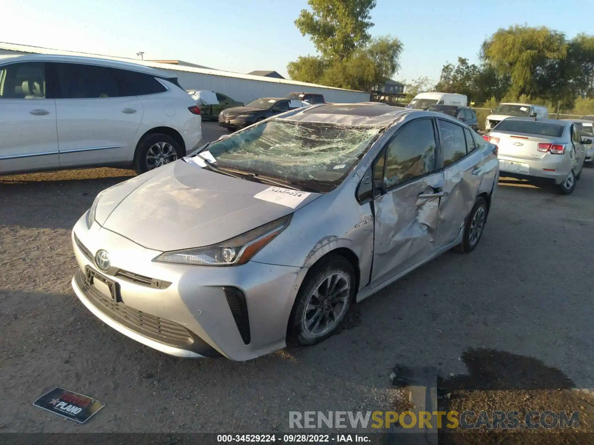 2 Photograph of a damaged car JTDKARFU7K3092293 TOYOTA PRIUS 2019