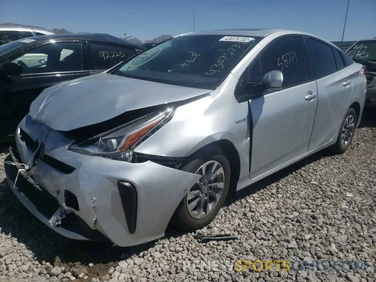 2 Photograph of a damaged car JTDKARFU7K3093654 TOYOTA PRIUS 2019