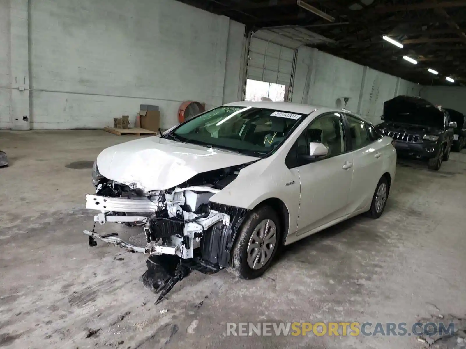 2 Photograph of a damaged car JTDKARFU7K3102272 TOYOTA PRIUS 2019