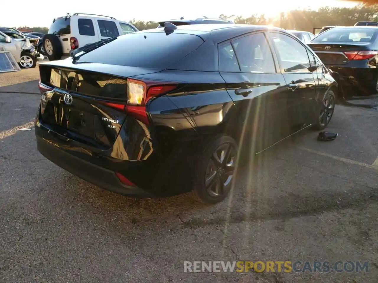 4 Photograph of a damaged car JTDKARFU8K3069136 TOYOTA PRIUS 2019