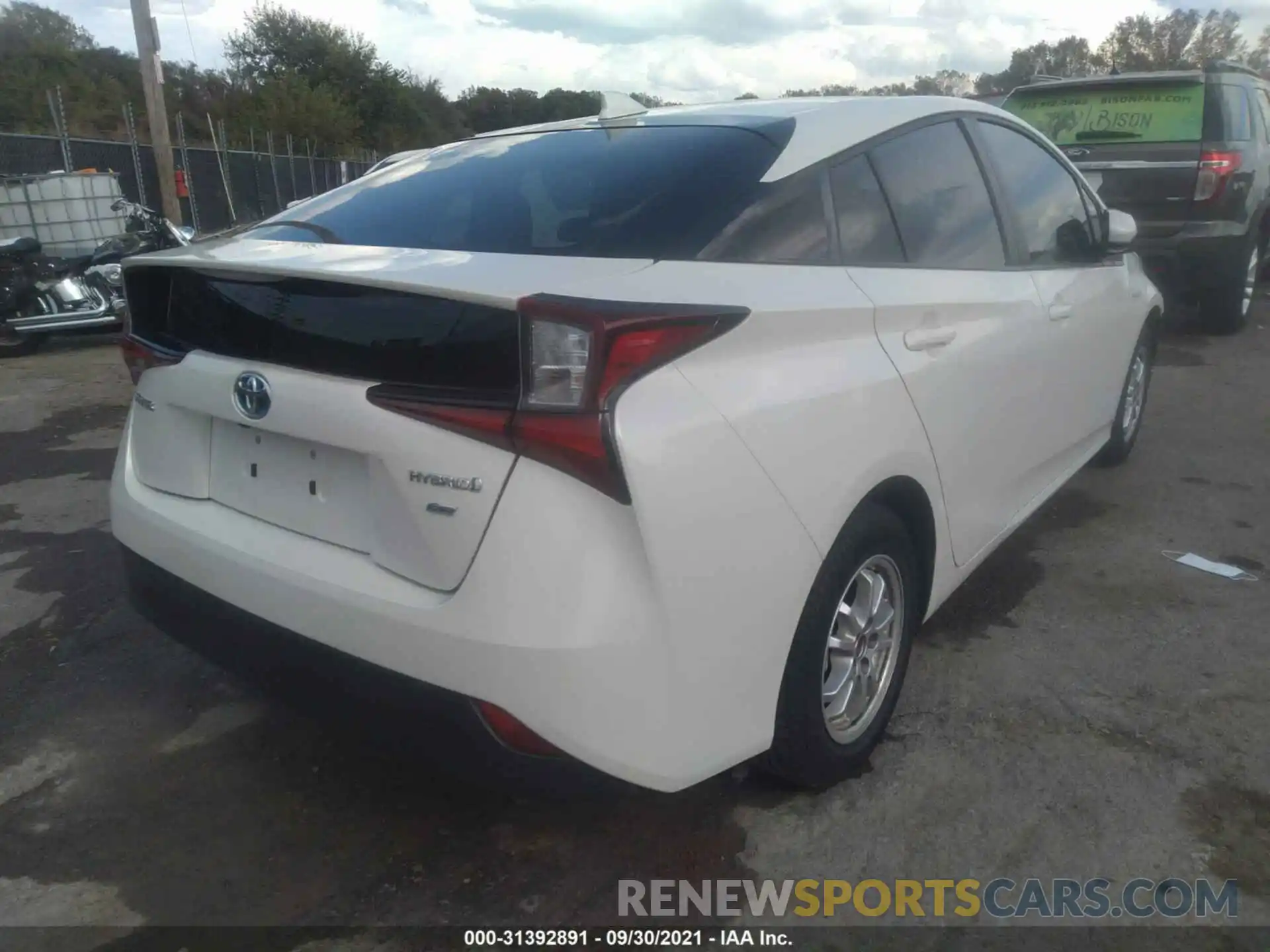 4 Photograph of a damaged car JTDKARFU9K3082655 TOYOTA PRIUS 2019