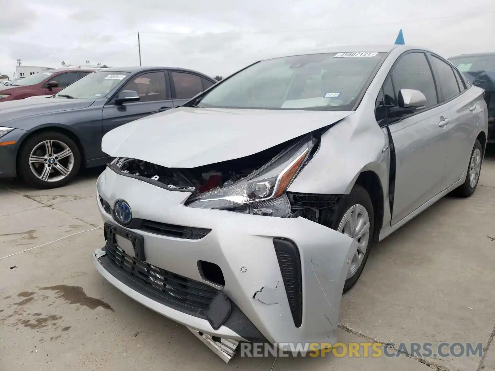 2 Photograph of a damaged car JTDKARFUXK3094653 TOYOTA PRIUS 2019