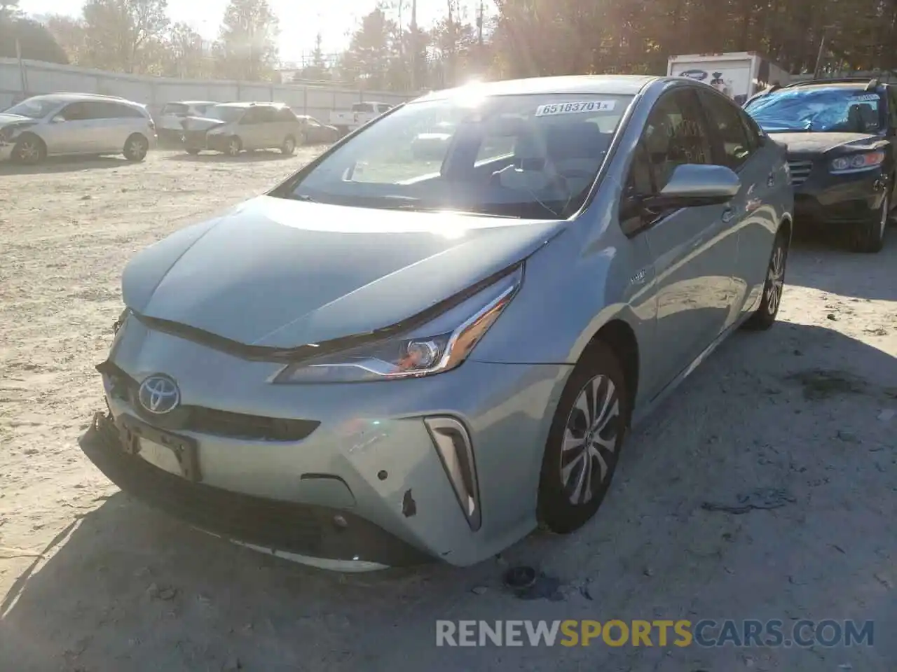 2 Photograph of a damaged car JTDL9RFU0K3001037 TOYOTA PRIUS 2019