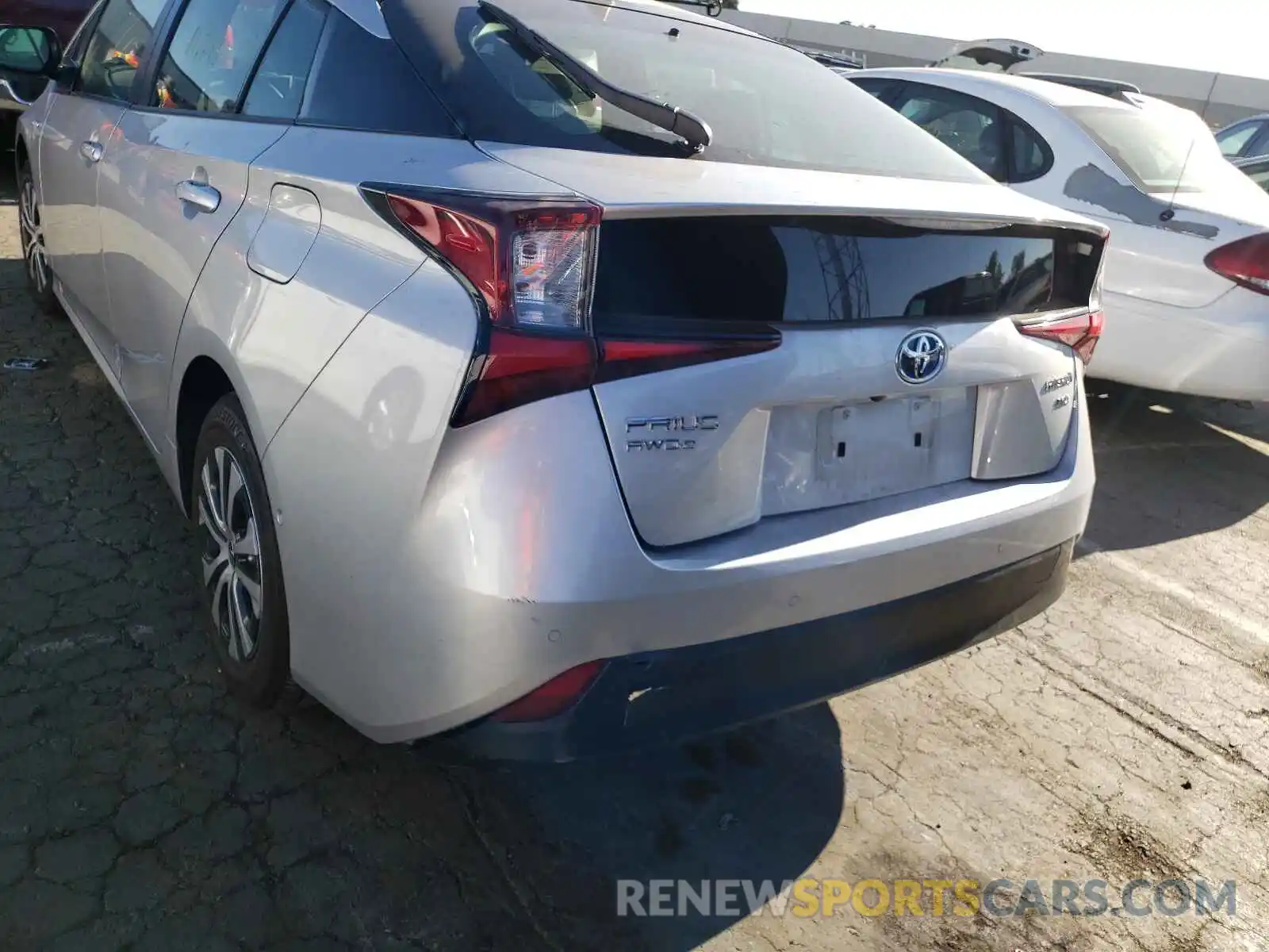 9 Фотография поврежденного автомобиля JTDL9RFU0K3004374 TOYOTA PRIUS 2019