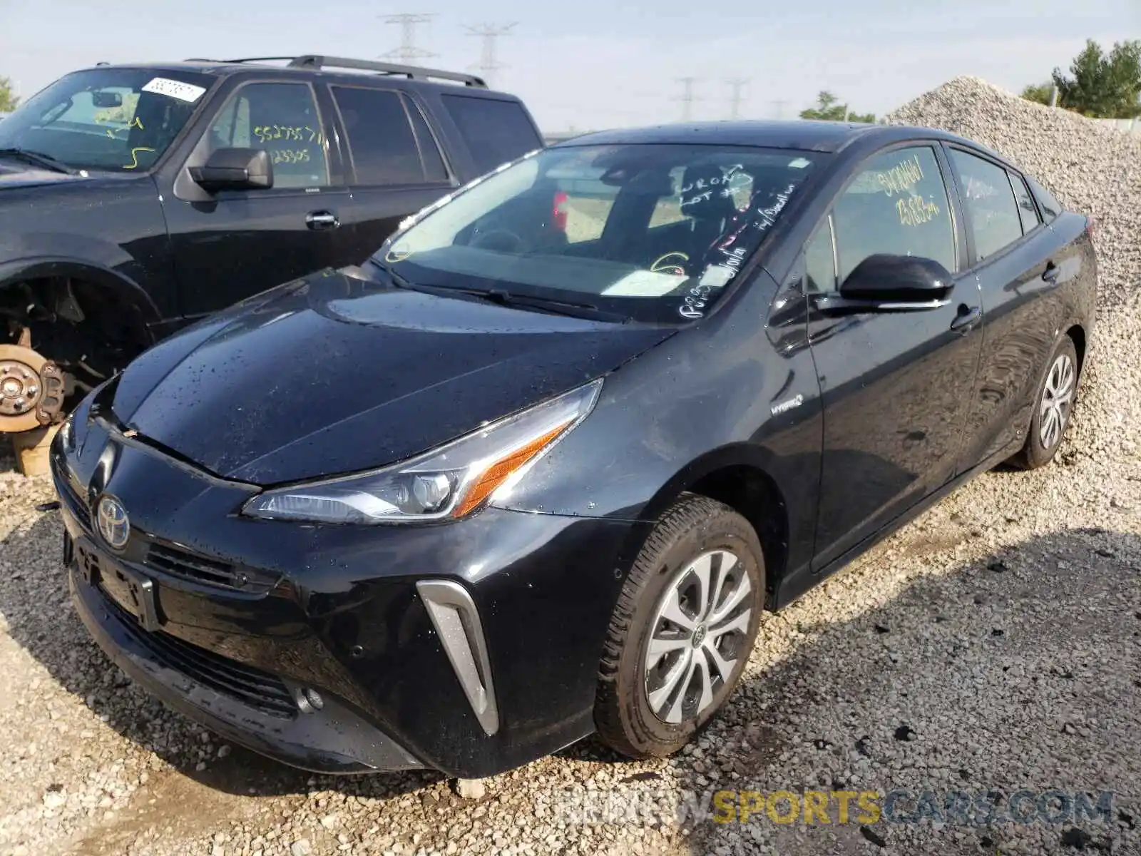 2 Фотография поврежденного автомобиля JTDL9RFU0K3006562 TOYOTA PRIUS 2019