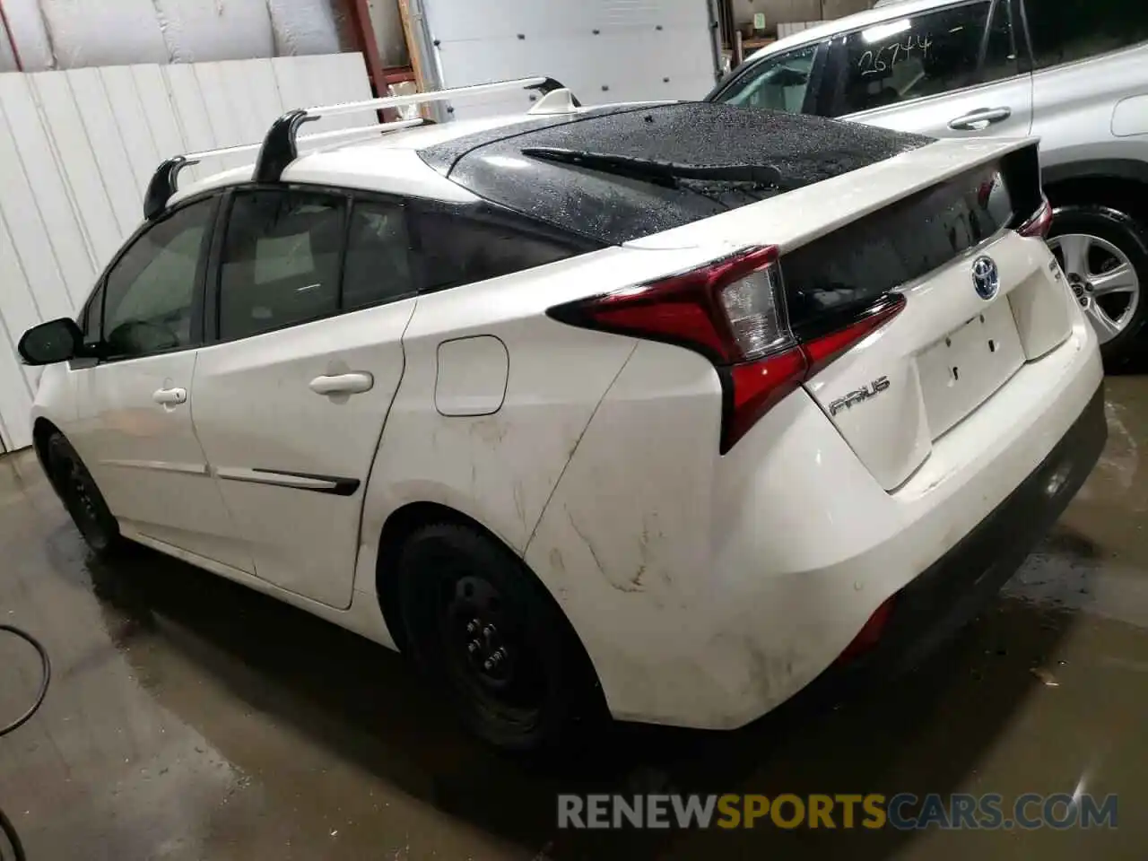 2 Photograph of a damaged car JTDL9RFU0K3011809 TOYOTA PRIUS 2019