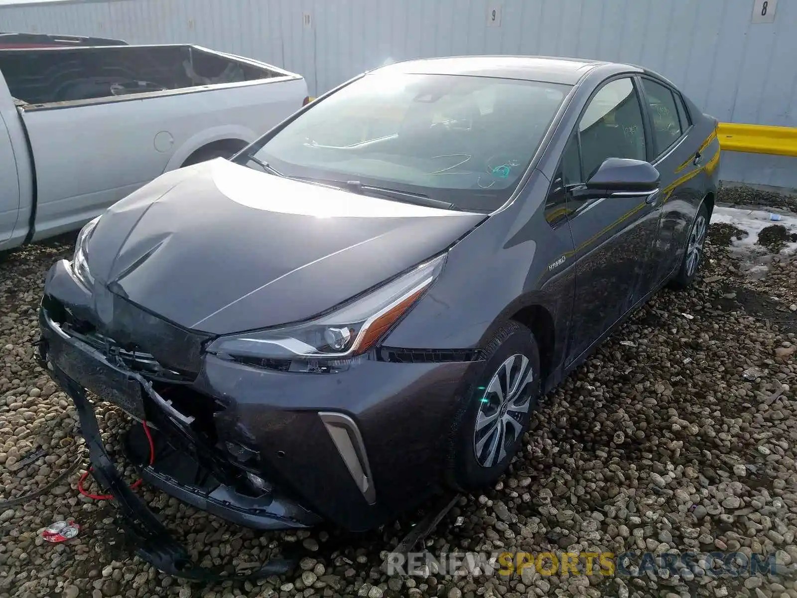 2 Фотография поврежденного автомобиля JTDL9RFU1K3001354 TOYOTA PRIUS 2019