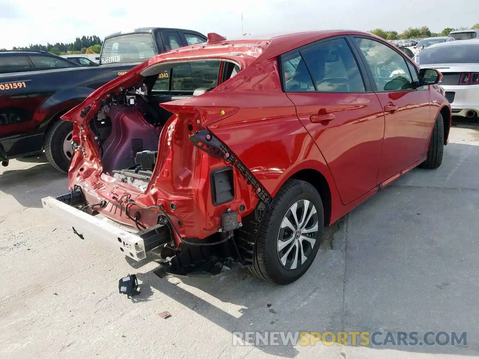 4 Photograph of a damaged car JTDL9RFU1K3003427 TOYOTA PRIUS 2019