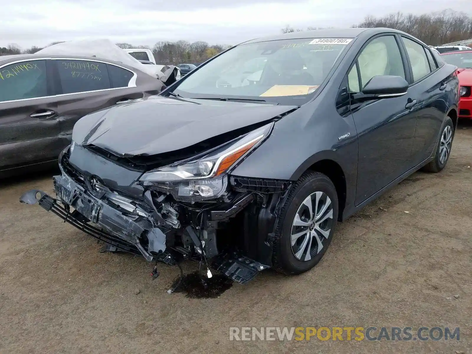 2 Photograph of a damaged car JTDL9RFU1K3004089 TOYOTA PRIUS 2019