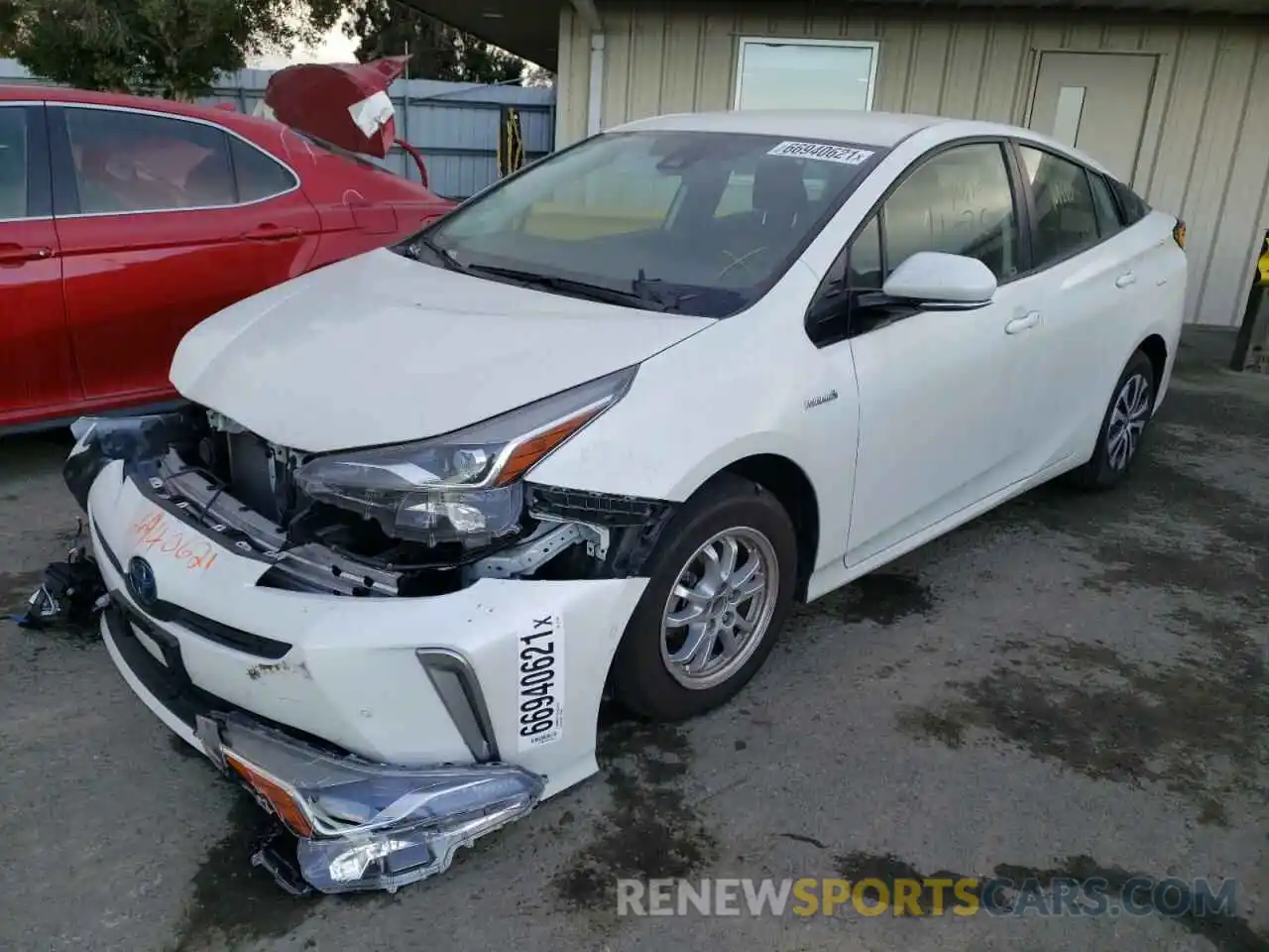 2 Photograph of a damaged car JTDL9RFU2K3011780 TOYOTA PRIUS 2019