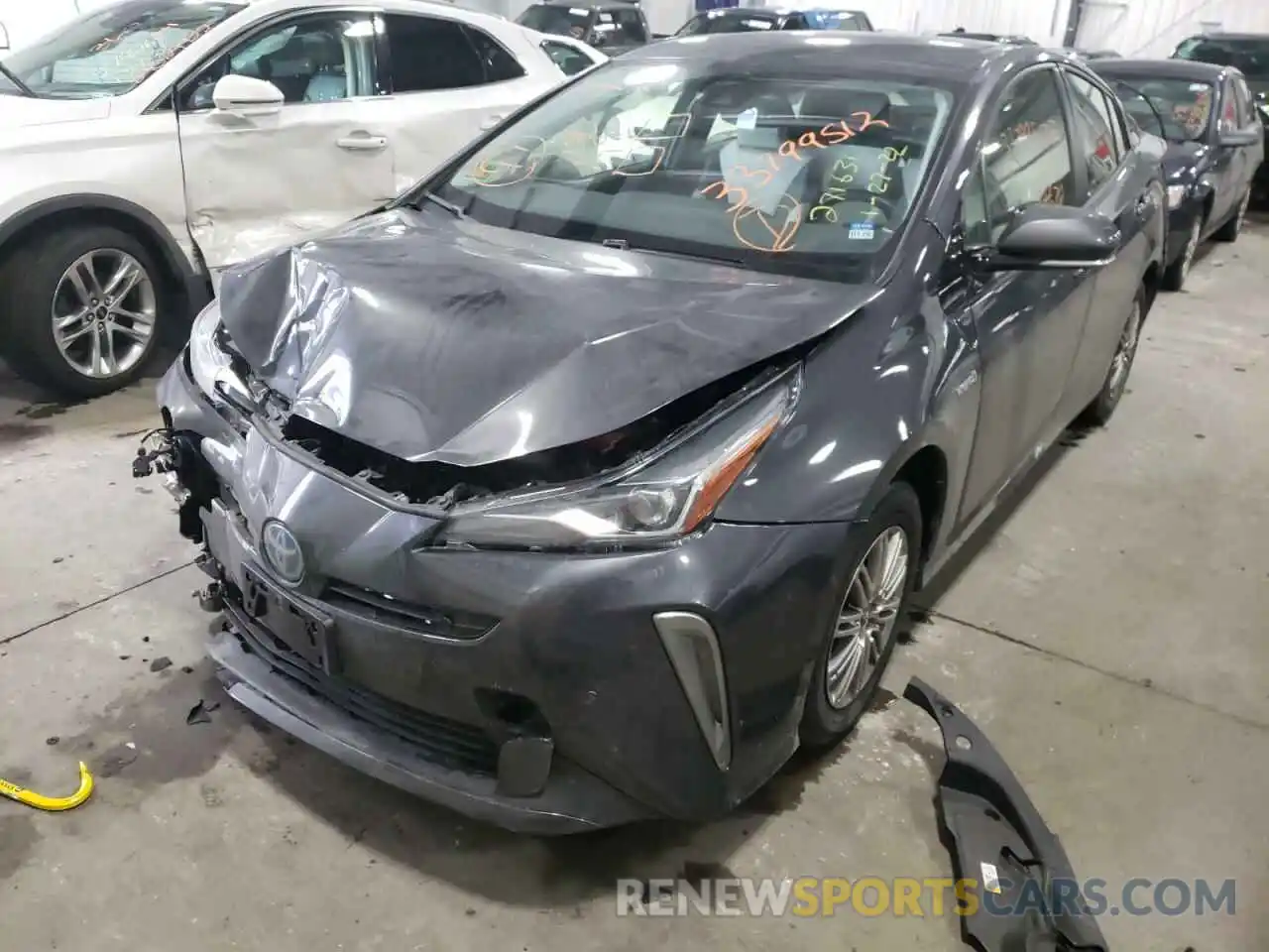 2 Photograph of a damaged car JTDL9RFU5K3004452 TOYOTA PRIUS 2019