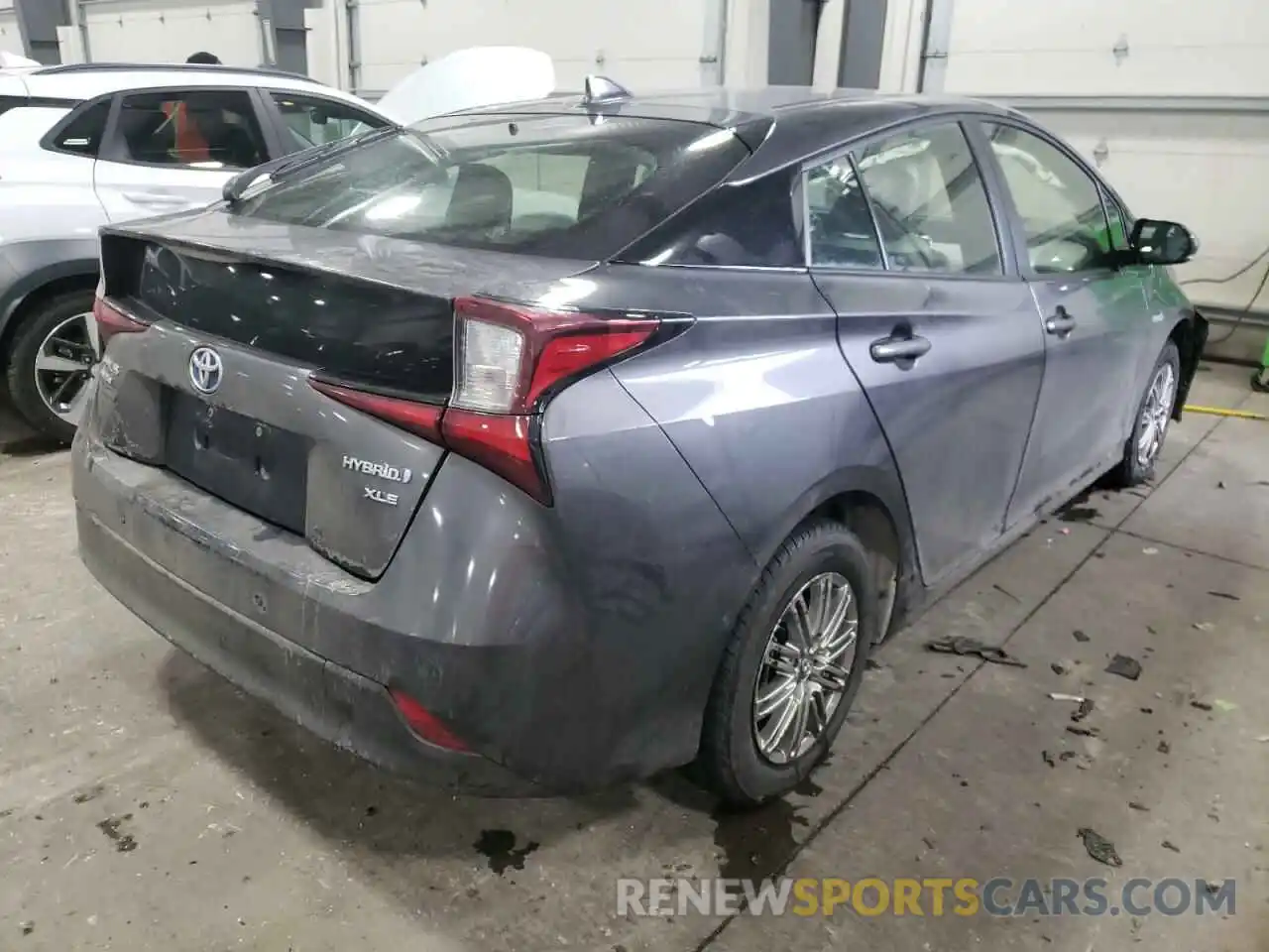 4 Photograph of a damaged car JTDL9RFU5K3004452 TOYOTA PRIUS 2019