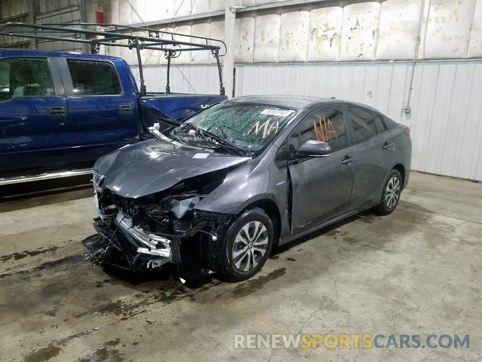 2 Photograph of a damaged car JTDL9RFU9K3004082 TOYOTA PRIUS 2019