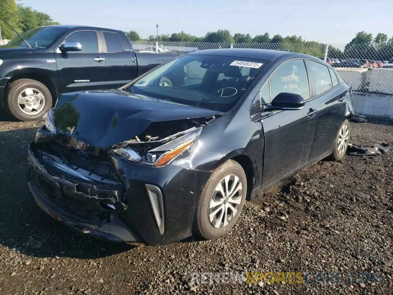 2 Photograph of a damaged car JTDL9RFU9K3009458 TOYOTA PRIUS 2019