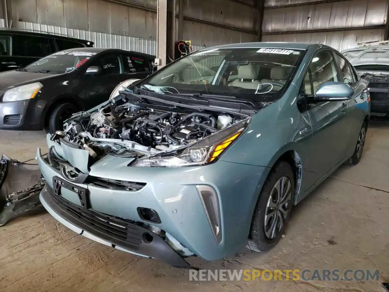 2 Photograph of a damaged car JTDL9RFU1L3015000 TOYOTA PRIUS 2020