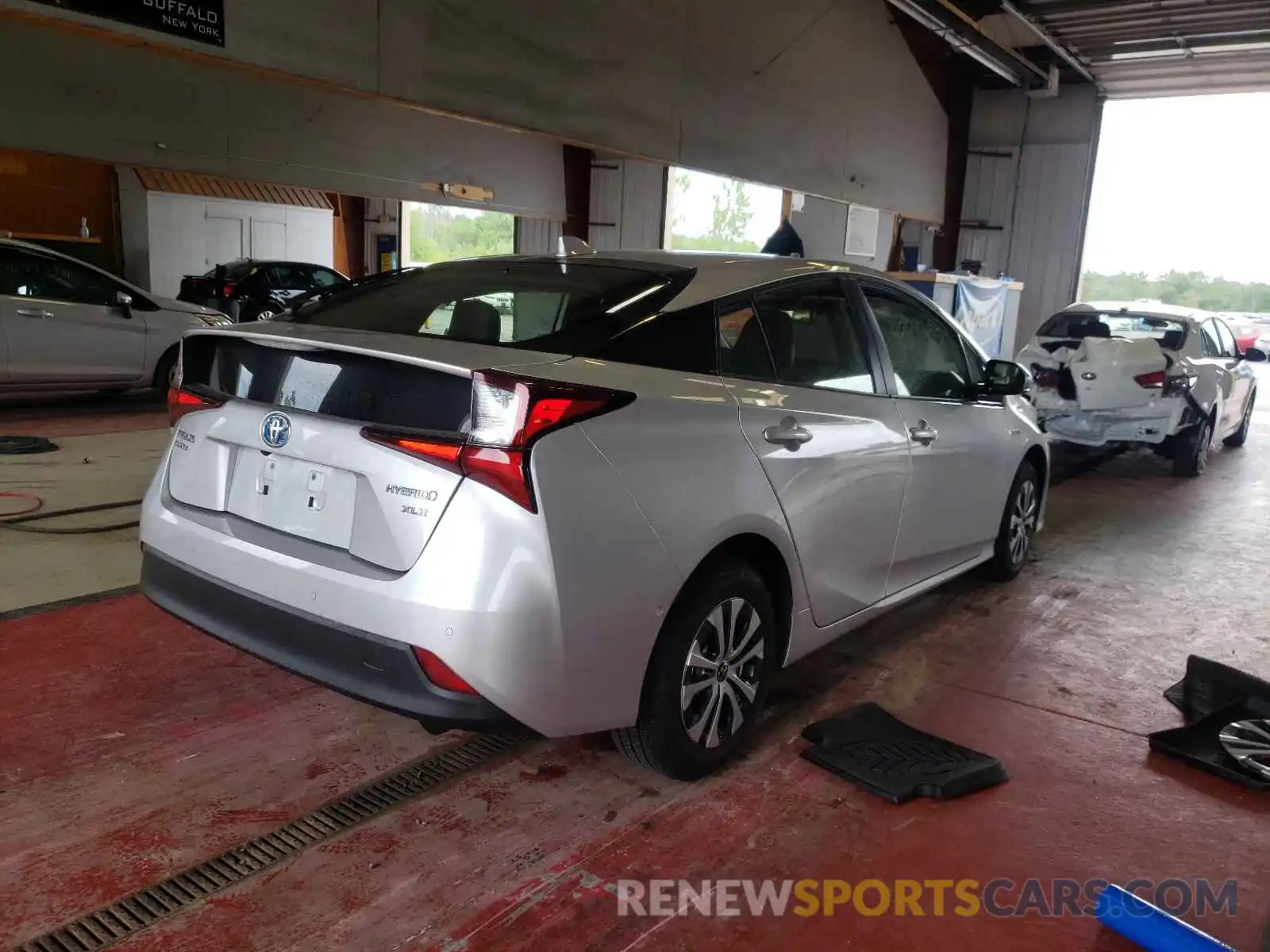 4 Photograph of a damaged car JTDL9RFU1L3015353 TOYOTA PRIUS 2020