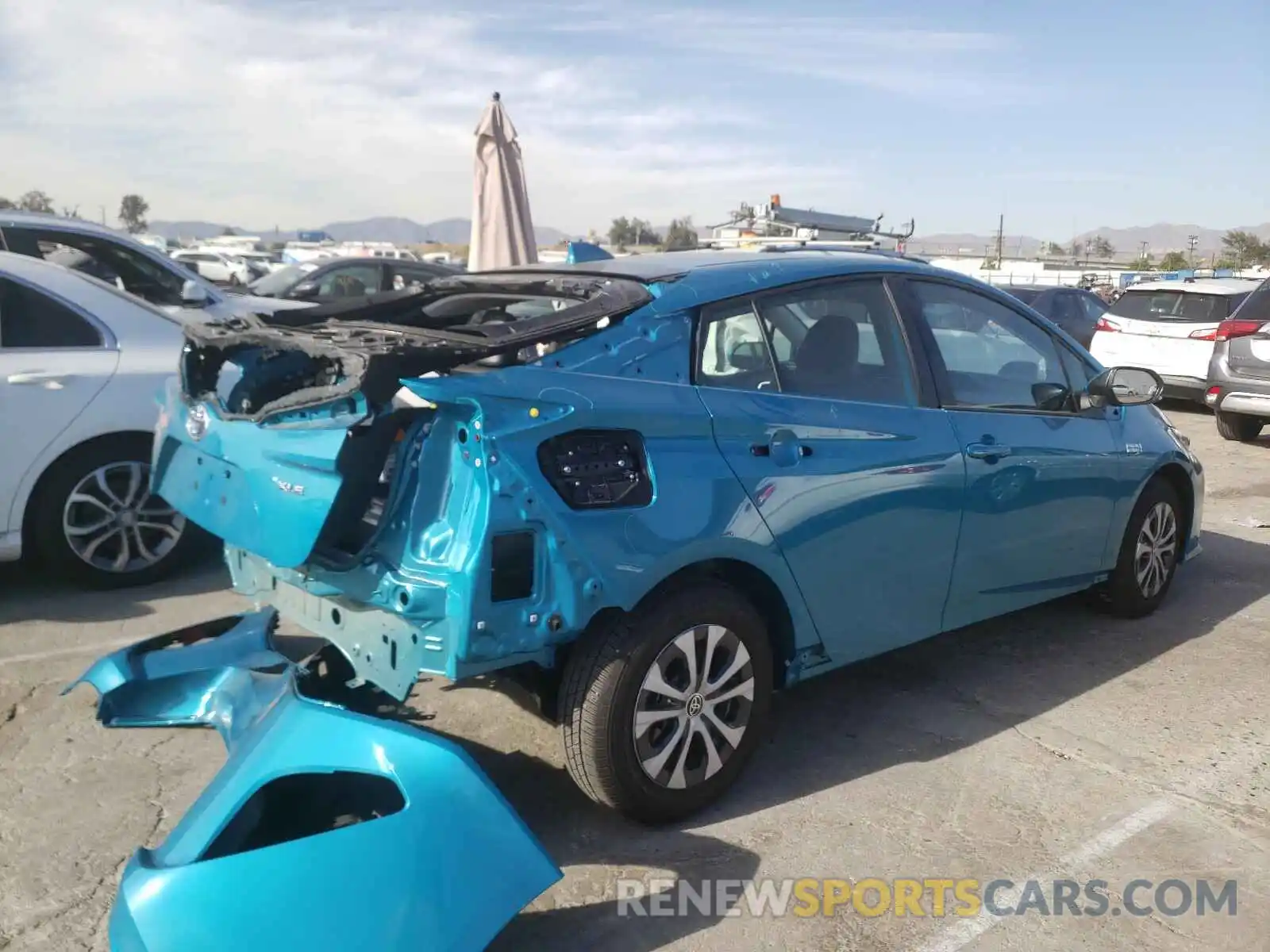 4 Photograph of a damaged car JTDKAMFP2M3169216 TOYOTA PRIUS 2021