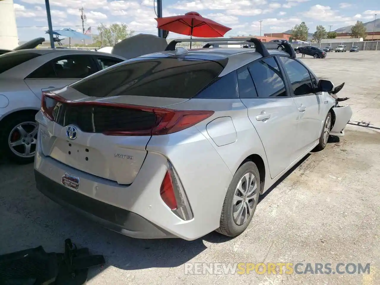 4 Photograph of a damaged car JTDKAMFP2M3181379 TOYOTA PRIUS 2021