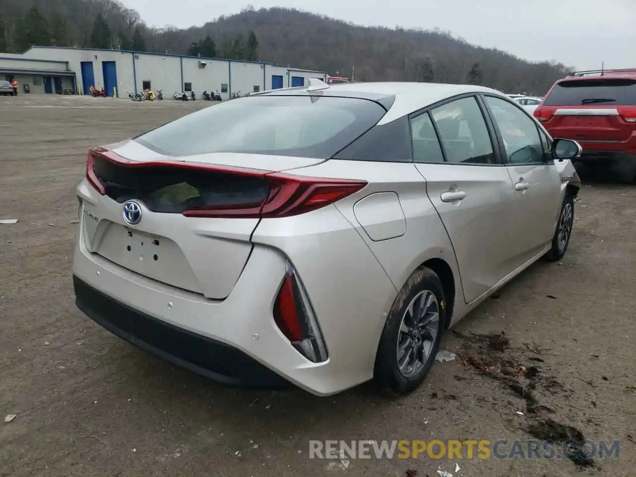 4 Photograph of a damaged car JTDKAMFP3M3169578 TOYOTA PRIUS 2021