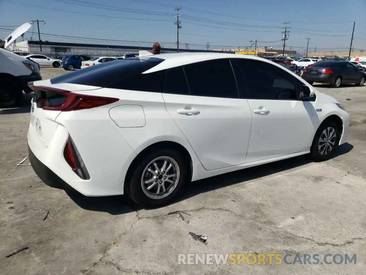 4 Photograph of a damaged car JTDKAMFP3M3183853 TOYOTA PRIUS 2021