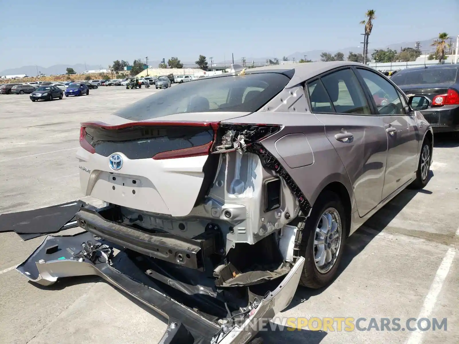 4 Photograph of a damaged car JTDKAMFP4M3177690 TOYOTA PRIUS 2021